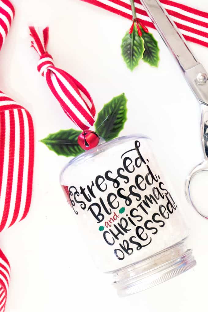 Calming Christmas Bath Salts in a mason jar ornament with the words, "Stressed, blessed, and Christmas Obsessed."